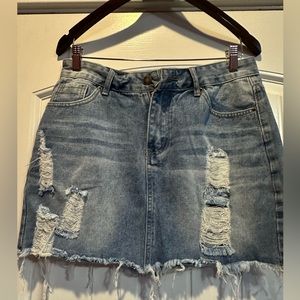 NWT. Mini denim skirt. Guanny brand. Size XL